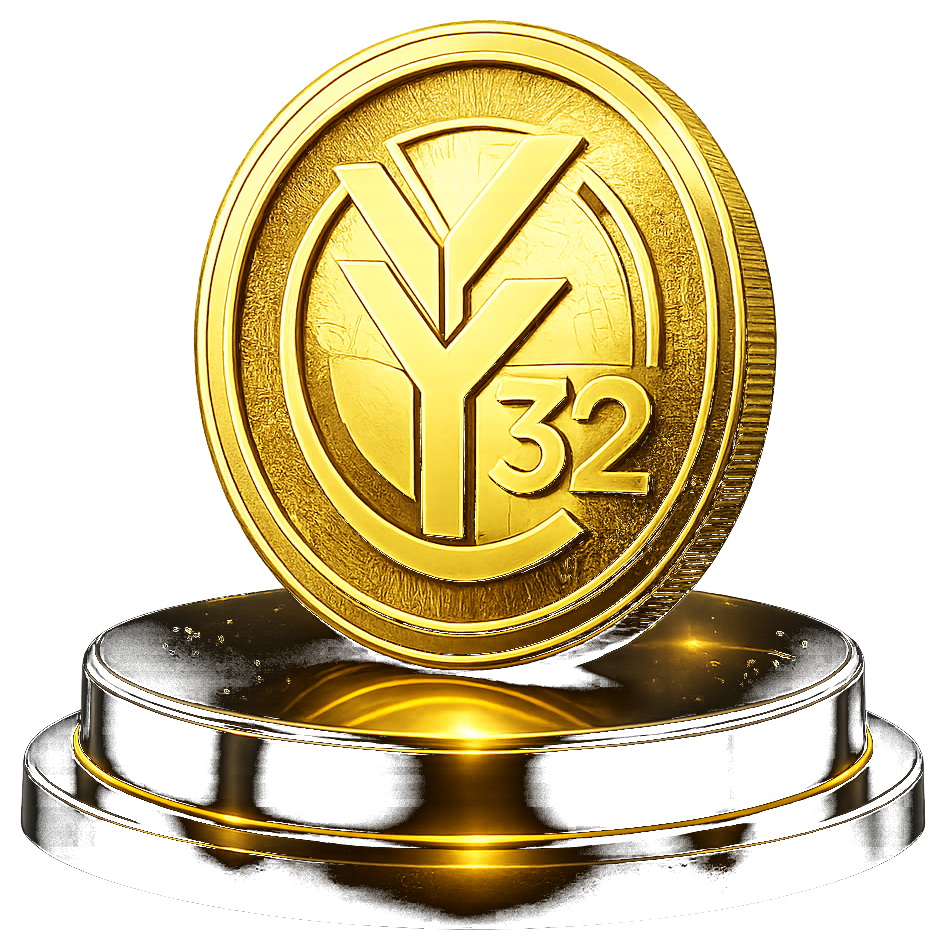 Gold YG32 token displayed on a black institutional pedestal